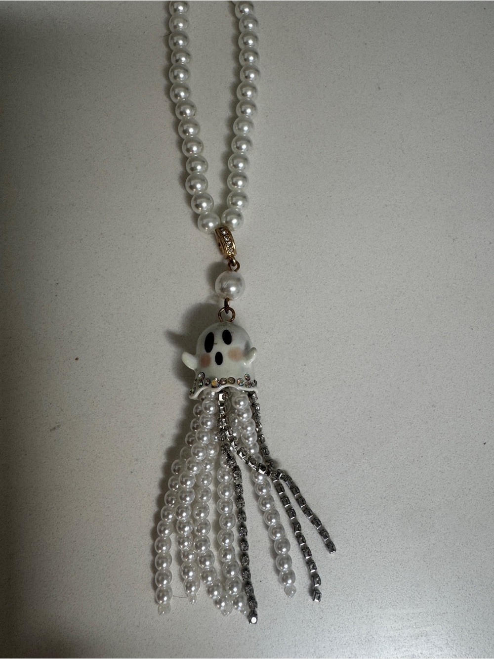 Betsey Johnson White Pearl Tassel Ghost Pendant Necklace with Gold Accent